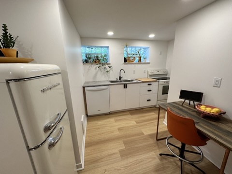 A bright kitchen with a retro-style refrigerator