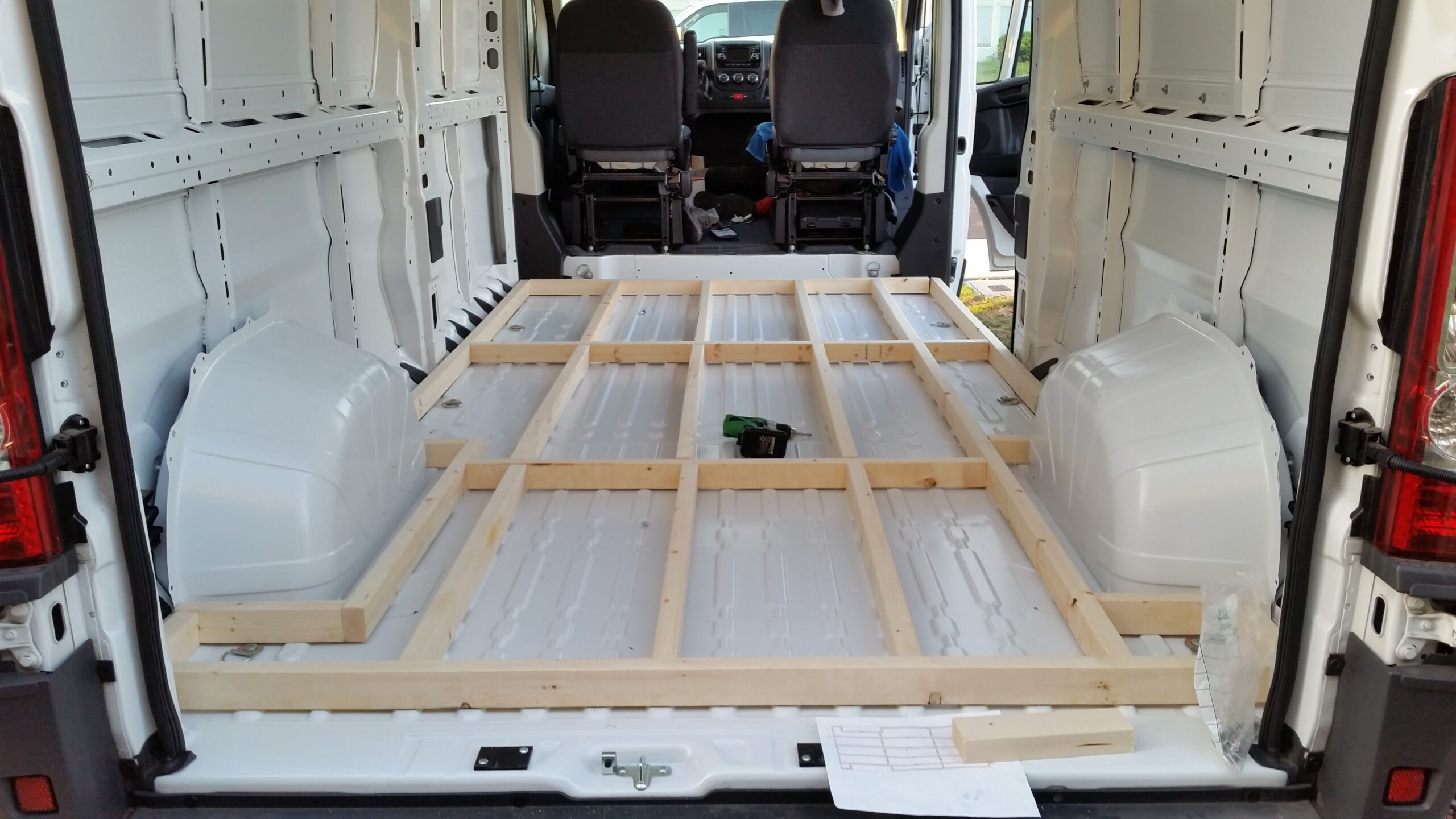 Empty cargo van with a wooden subfloor
