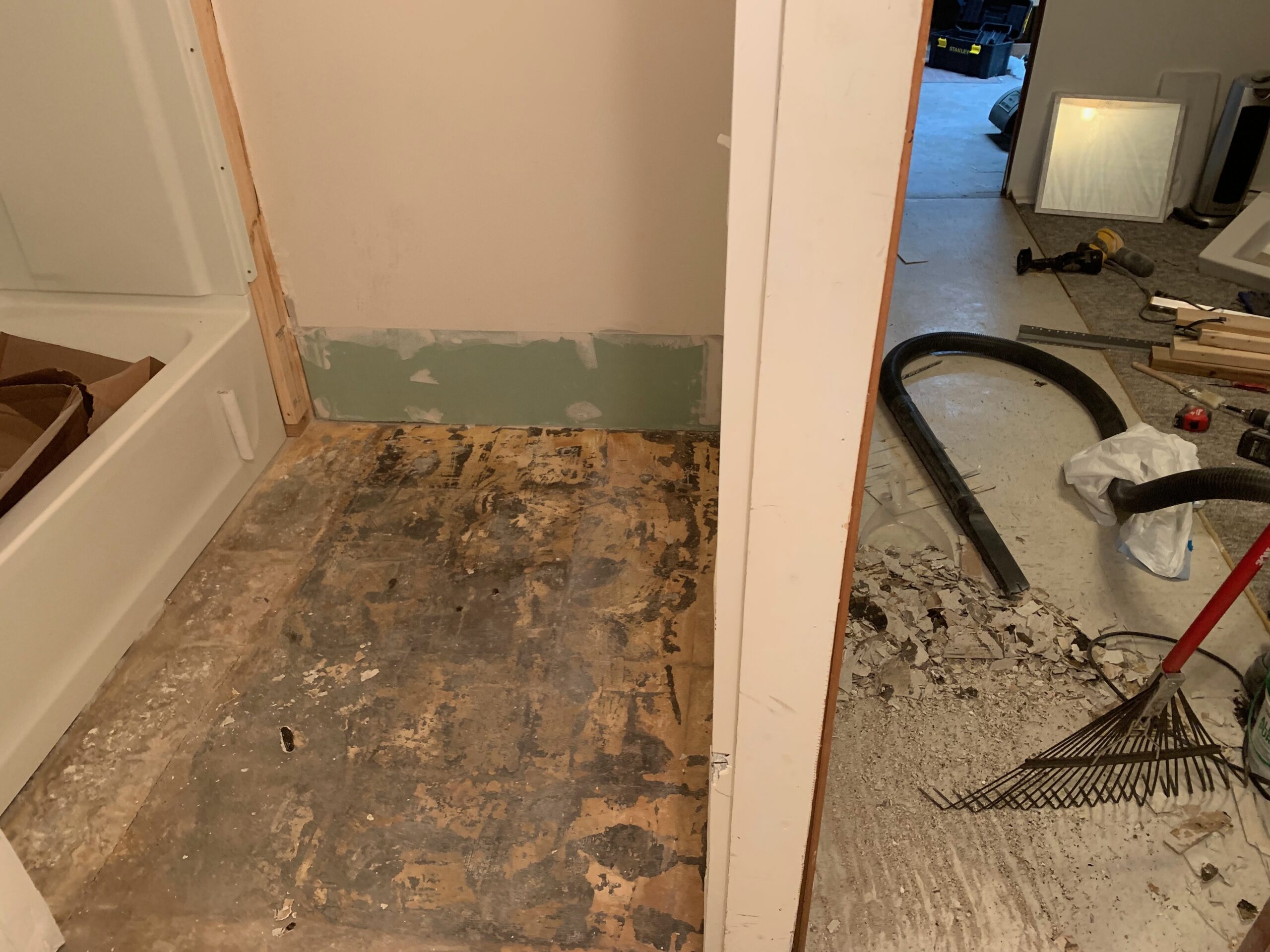 Room with old flooring removed and subfloor exposed
