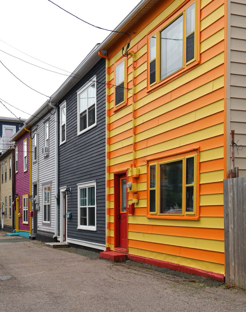 Stock photo of a colorful row of small multi-family houses