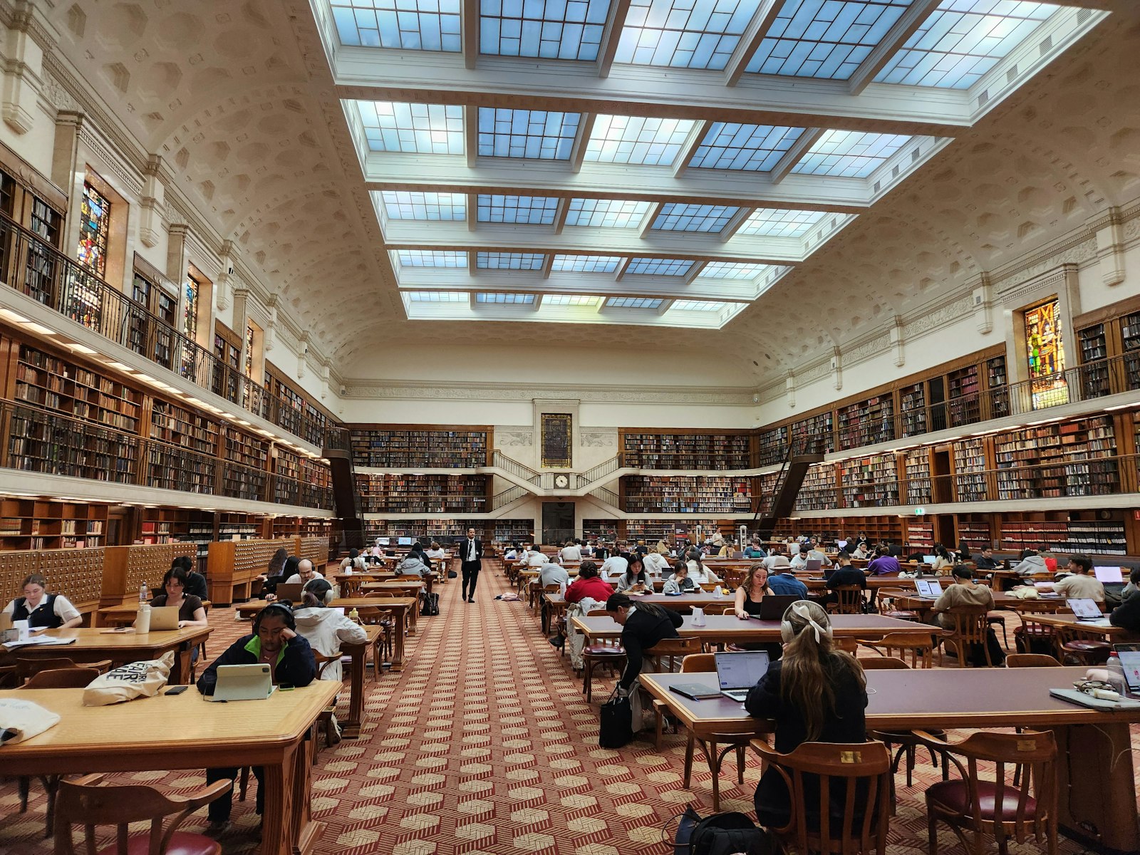 Tall library shelves filled with books