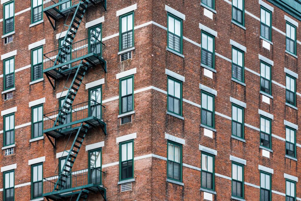 Stock photo of a corner apartment building in New York