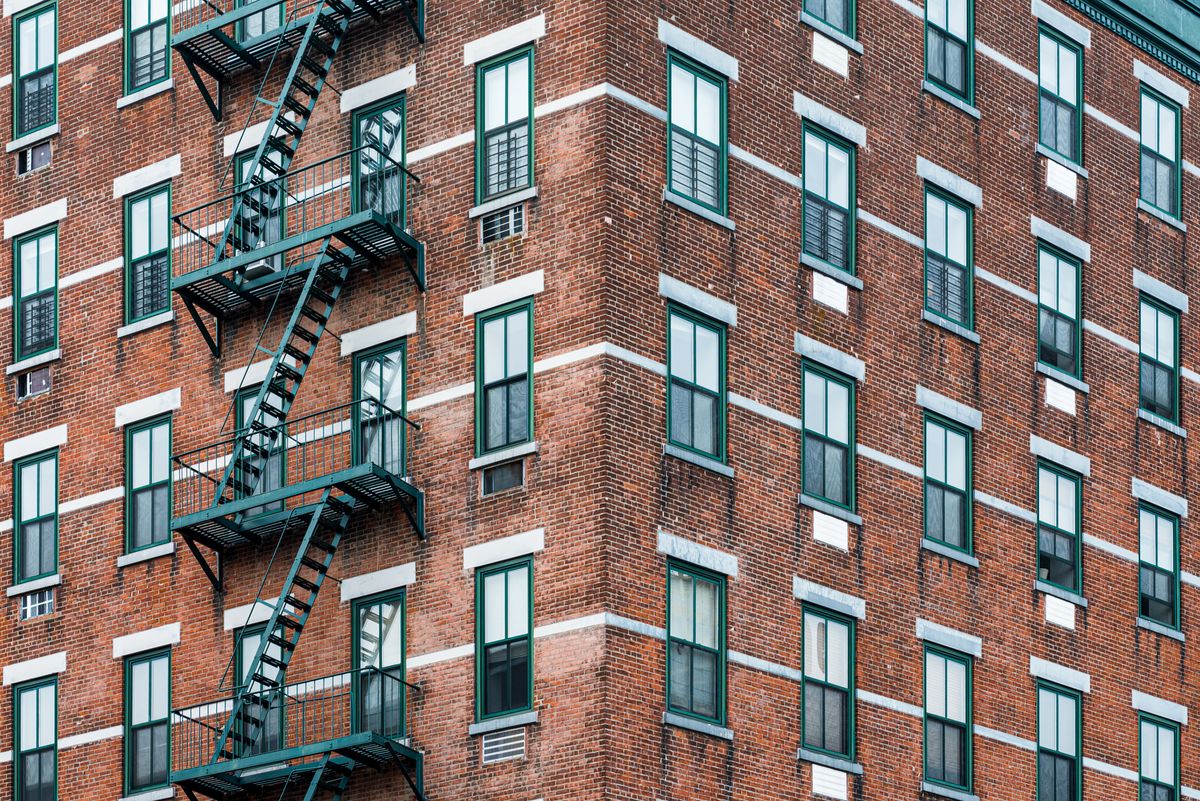 Stock photo of a corner apartment building in New York